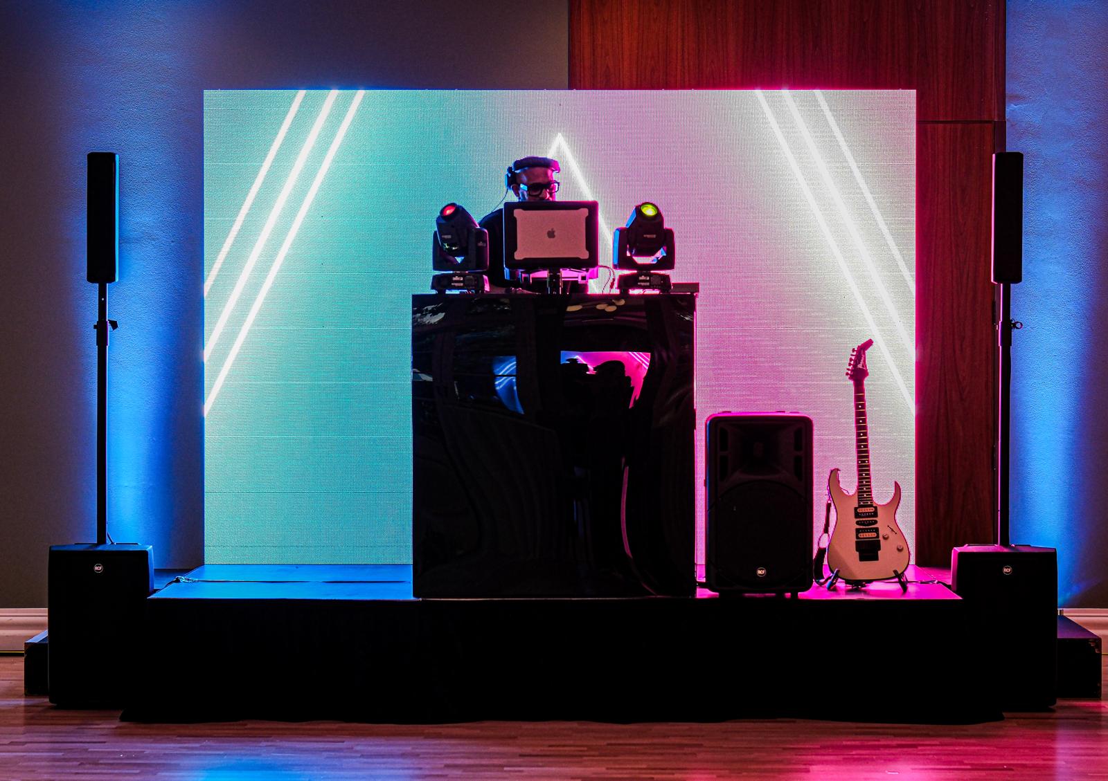 DJ booth with LED wall lighting